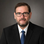 Andrew Woodcock LLB, LLM, BA, MLA(Harvard)